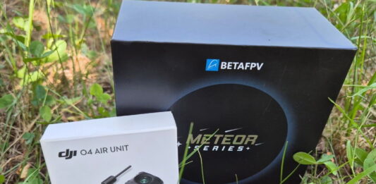 BetaFPV Meteor75 Pro O4 micro drone on display with prop guards and HD camera, set against a clean background.