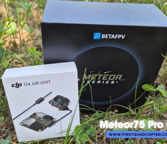 BetaFPV Meteor75 Pro O4 micro drone on display with prop guards and HD camera, set against a clean background.
