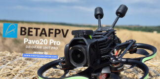 BetaFPV Pavo20 Pro O4 Pro cinewhoop drone equipped with DJI O4 Air Unit, shown on a hay bale ready for flight.