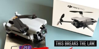 DJI Mini 5 Pro drone folded on a digital scale displaying 253 grams.