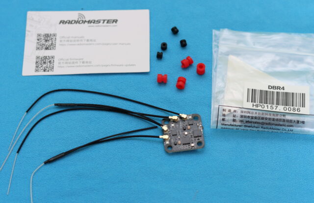 Radiomaster DBR4 receiver unboxing with packaging, accessories, and close-up view of the module.