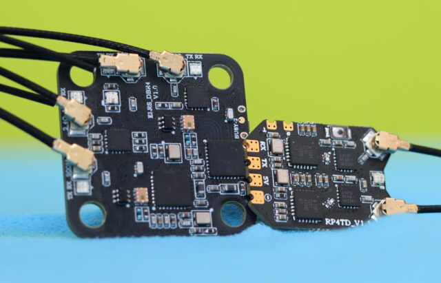 Side-by-side comparison of Radiomaster DBR4 and RP4TD ExpressLRS receivers, showing size, design, and ports.