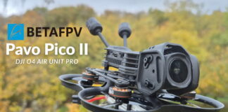 BetaFPV Pavo Pico II cinewhoop drone on a table with prop guards and camera mounted, ready for flight testing.