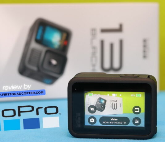 GoPro Hero 13 Review – An Honest Hands-On Test GoPro Hero 13 Black placed on a table during a hands-on review, with accessories and packaging visible in the background.