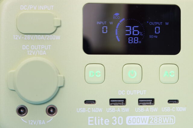 Close-up of the Bluetti Elite 30 V2 showing its DC output ports and the illuminated LCD display.