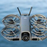 DJI NEO 2 FPV drone with forward-looking LiDAR, upgraded camera, and stabilized gimbal in flight.