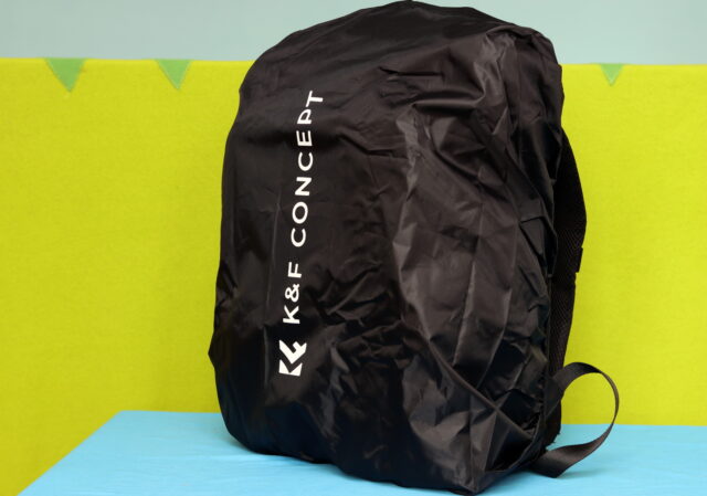 K&F Concept Nature Wander 11 camera backpack covered with the included rain cover for full weather protection.