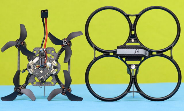 BetaFPV Pavo20 Pro II frame parts laid out alongside the AIO flight controller.