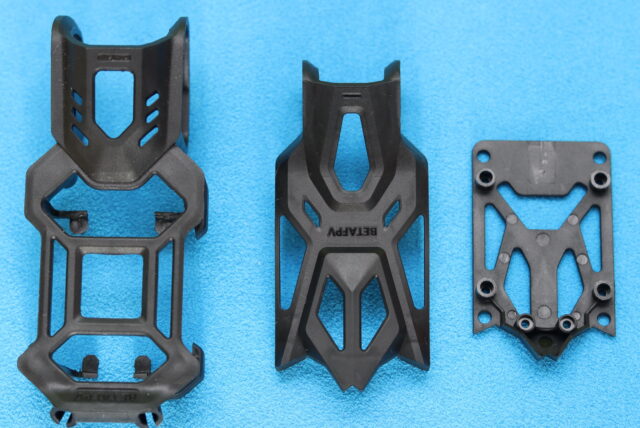 Side-by-side comparison of the DJI O4 Air Unit Pro and O4 Air Unit Lite brackets installed on the BetaFPV Pavo20 Pro II frame.