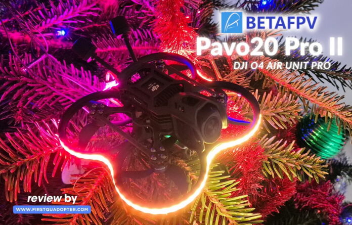 BetaFPV Pavo20 Pro II FPV drone resting on top of a Christmas tree, illuminated by colorful RGB LEDs.