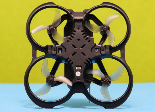 Bottom view of the BetaFPV Aquila20 HD showing the optical flow and positioning sensors