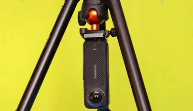 Low-angle shot using the K&F CONCEPT 63-Inch (O235A1) Tripod with the center column reversed, showing the camera close to the ground.