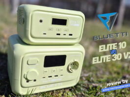 Side‑by‑side comparison of the Bluetti Elite 10 and Bluetti Elite 30 V2 portable power stations on a table with some accessories, showing both units clearly for a review photo.