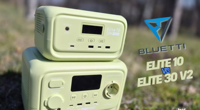 Side‑by‑side comparison of the Bluetti Elite 10 and Bluetti Elite 30 V2 portable power stations on a table with some accessories, showing both units clearly for a review photo.