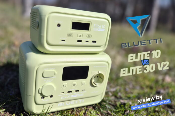 Side‑by‑side comparison of the Bluetti Elite 10 and Bluetti Elite 30 V2 portable power stations on a table with some accessories, showing both units clearly for a review photo.