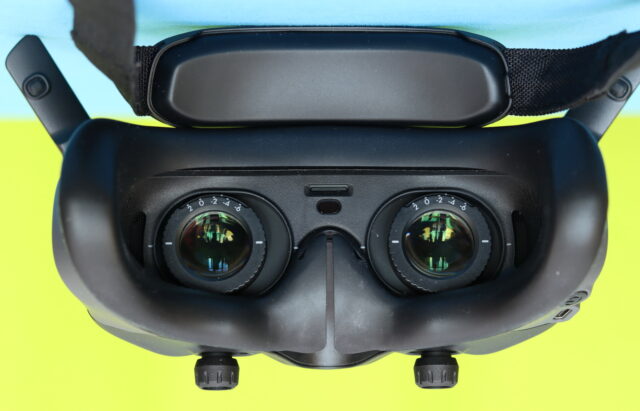 Close-up of DJI Goggles 3 lenses showing built-in diopter adjustment controls