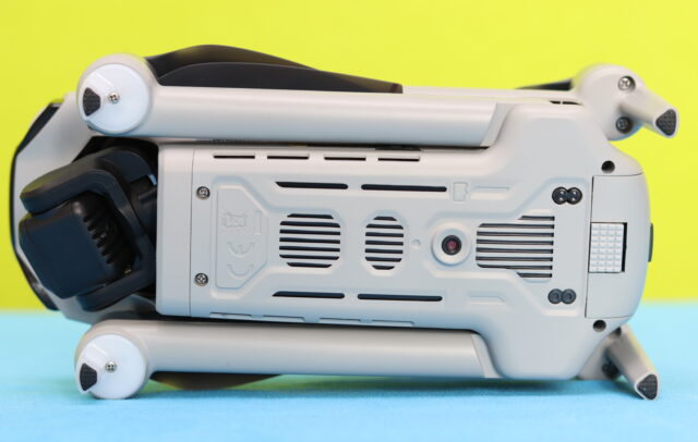 Close-up of the Ruko F11PRO 2 Plus underside showing the Time-of-Flight (TOF) sensor and optical flow camera used for precise low-altitude positioning and stable hovering.