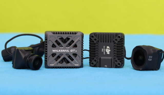 Side-by-side comparison image of Walksnail Avatar GT2 and DJI O4 Air Unit Pro showing differences in size, design, antenna layout, and camera modules used in digital FPV systems.